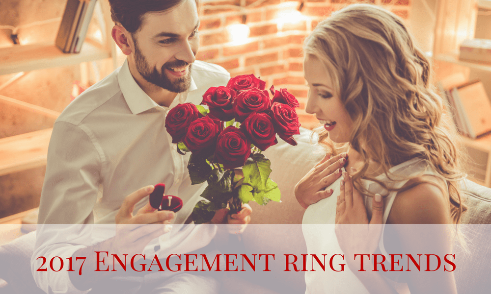 Image of man proposing to a beautiful young blond woman. The man is holding a bouquet of red roses and a diamond engagement ring.